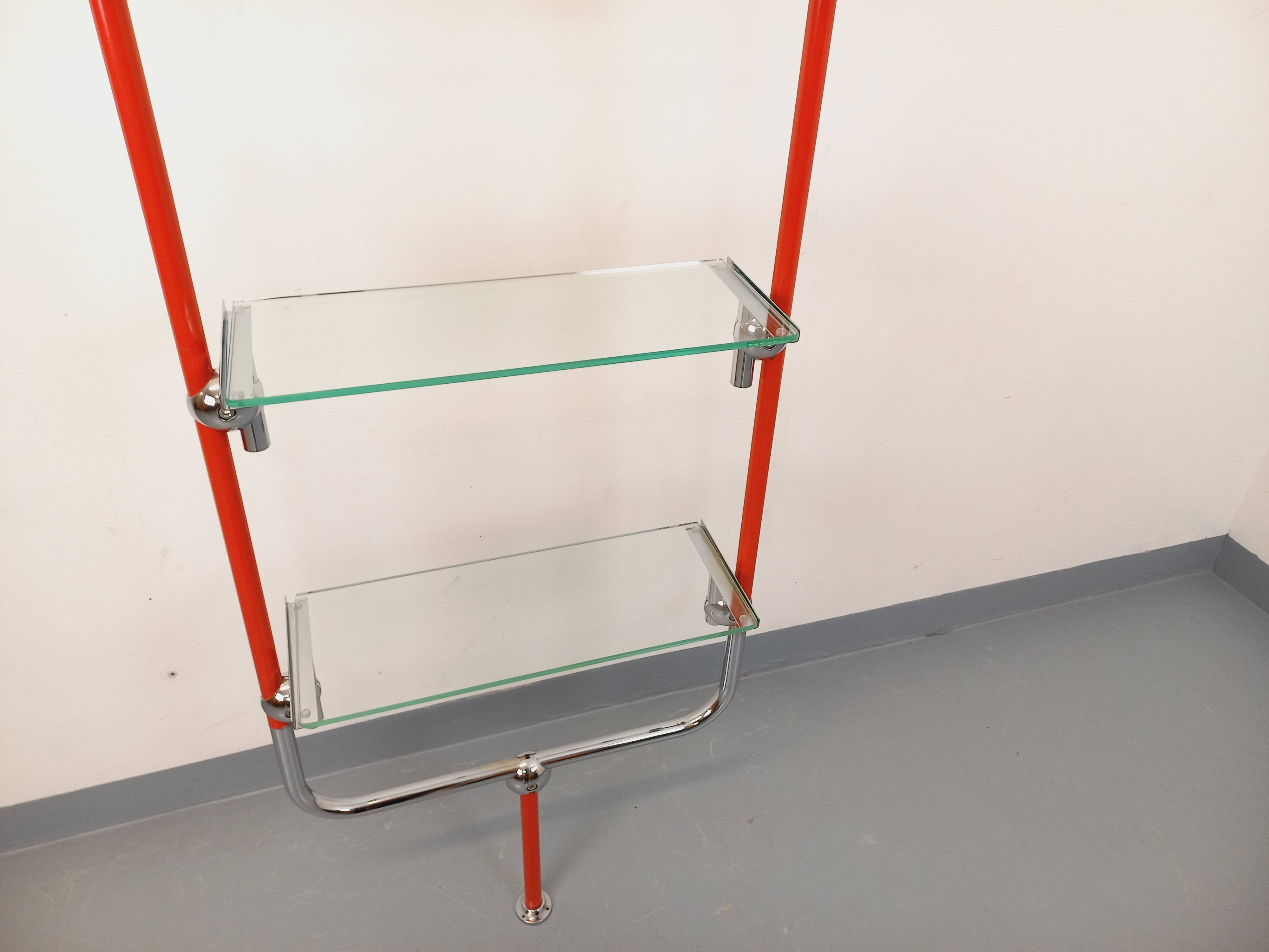 Modular bookshelf in vintage Bauhaus style, red metal, chrome.