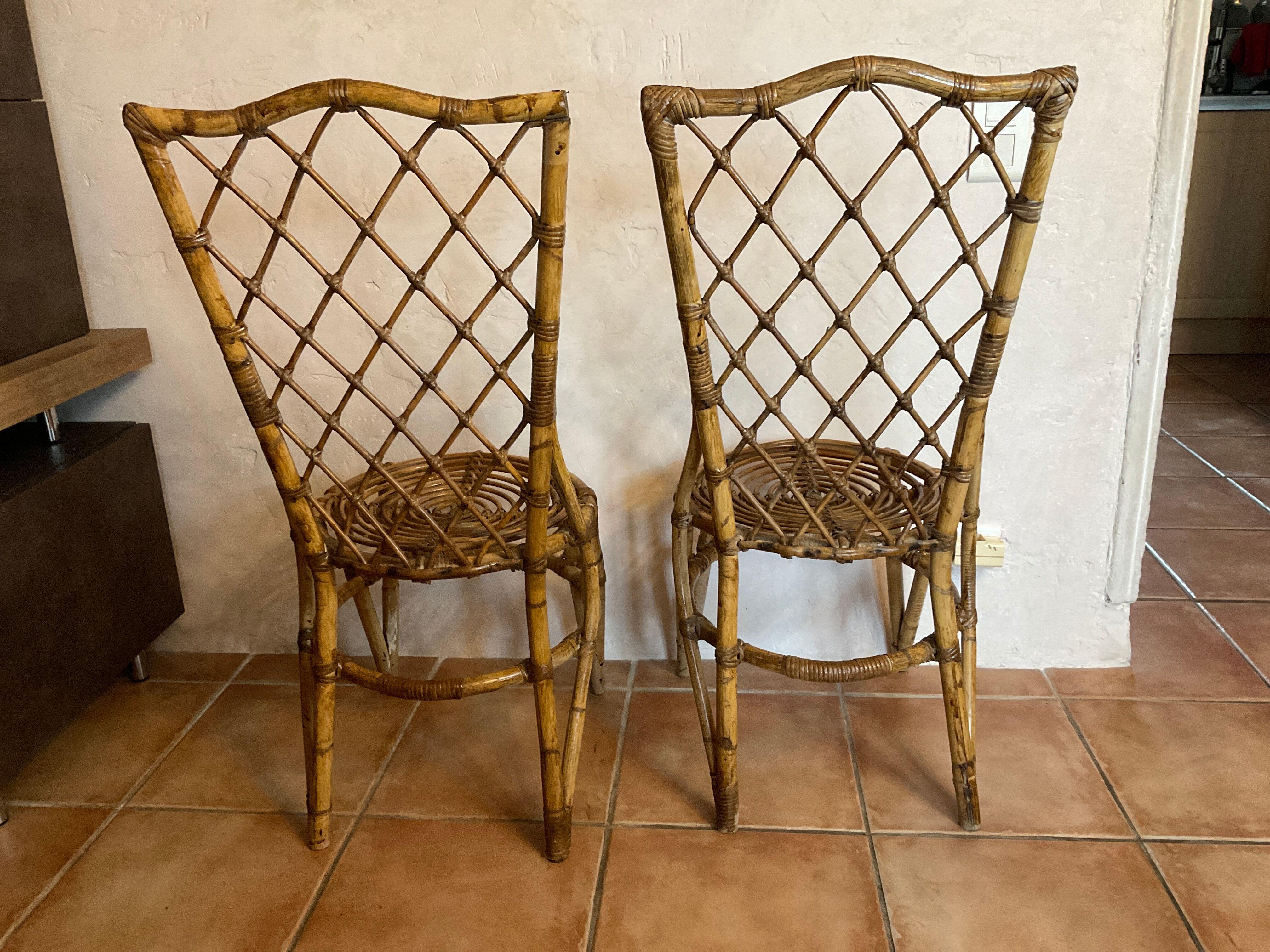 Pair of vintage rattan chairs Louis Sognot