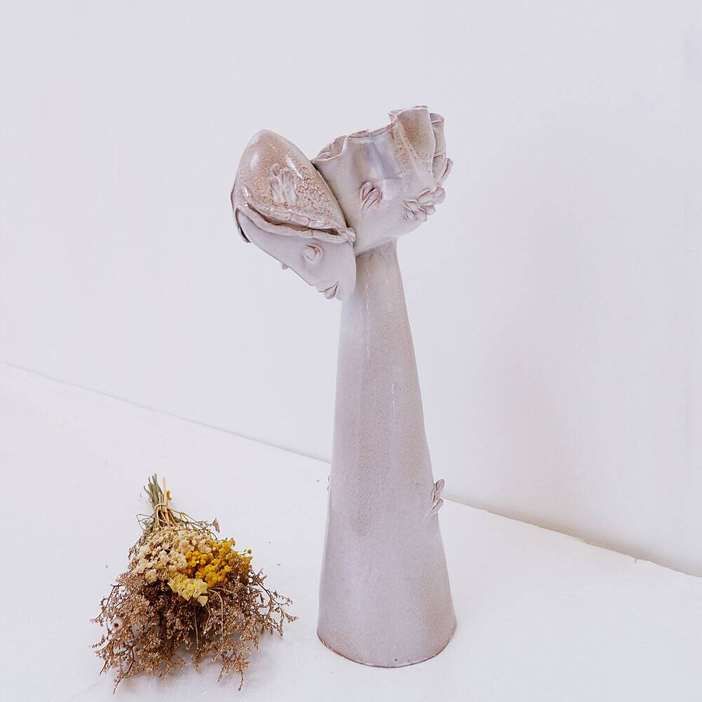 Ceramic sculpture of a female face - flower vase decoration