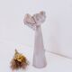Ceramic sculpture of a female face - flower vase decoration