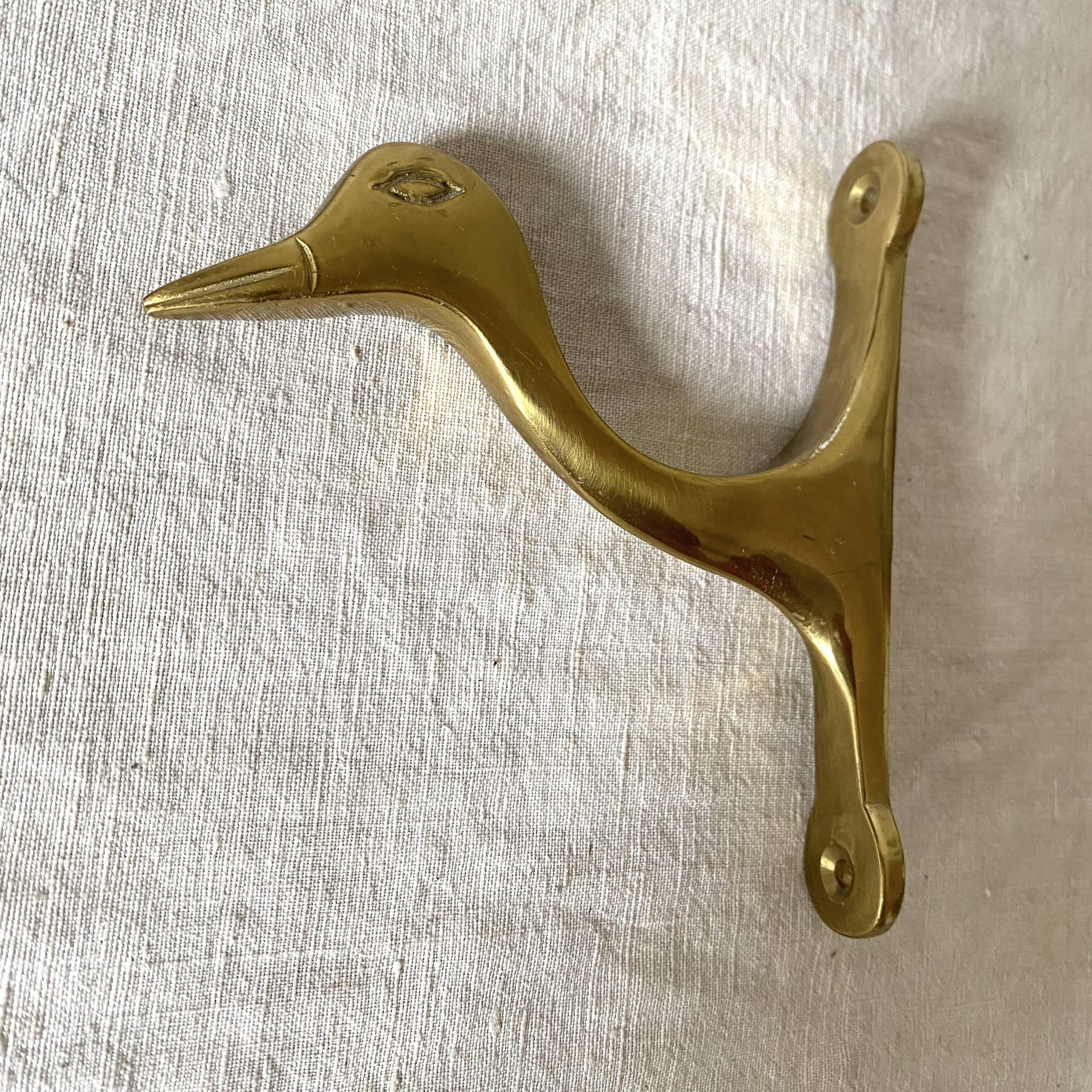 Brass coat hook, zoomorphic towel holder, bird