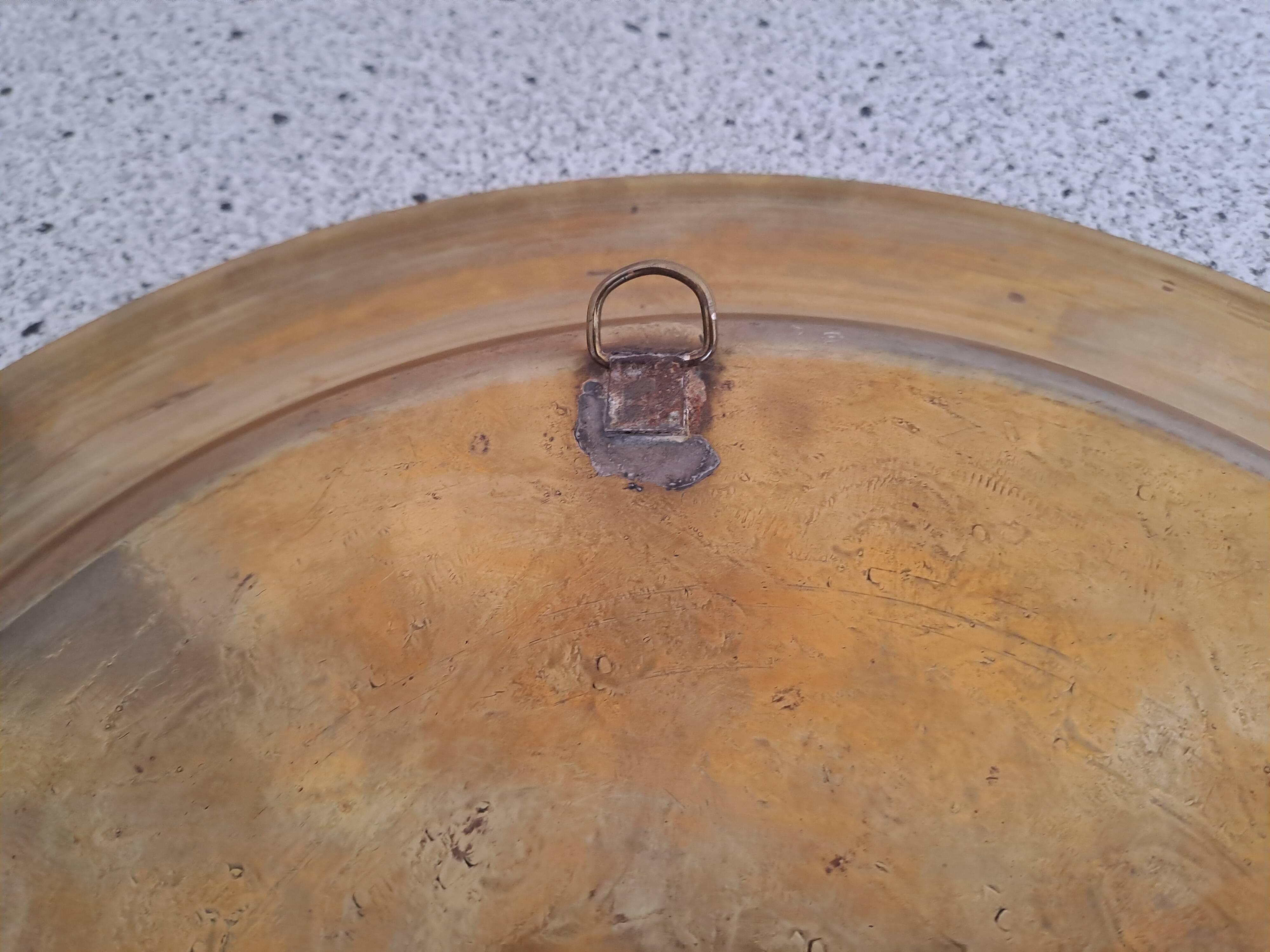 Large chiseled metal plate