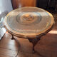 Round coffee table in Louis XV style, with sun cane and glass top.