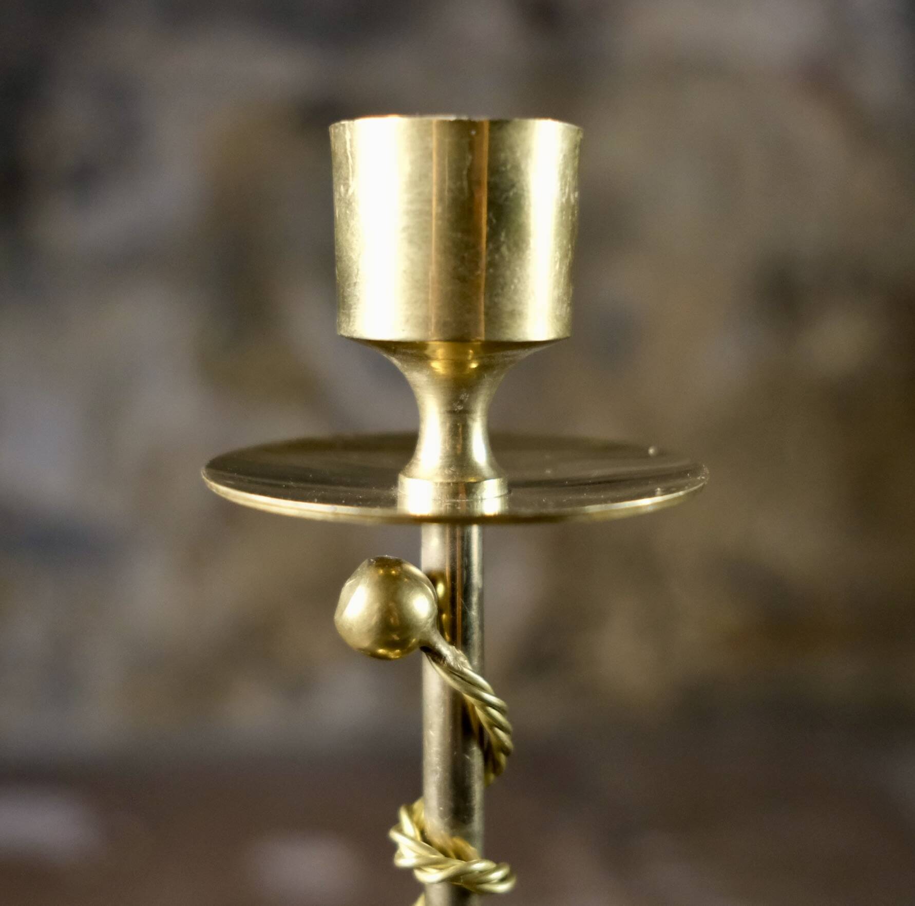 Pair of Art Deco twisted brass candlesticks, France, 1930s
