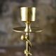Pair of Art Deco twisted brass candlesticks, France, 1930s
