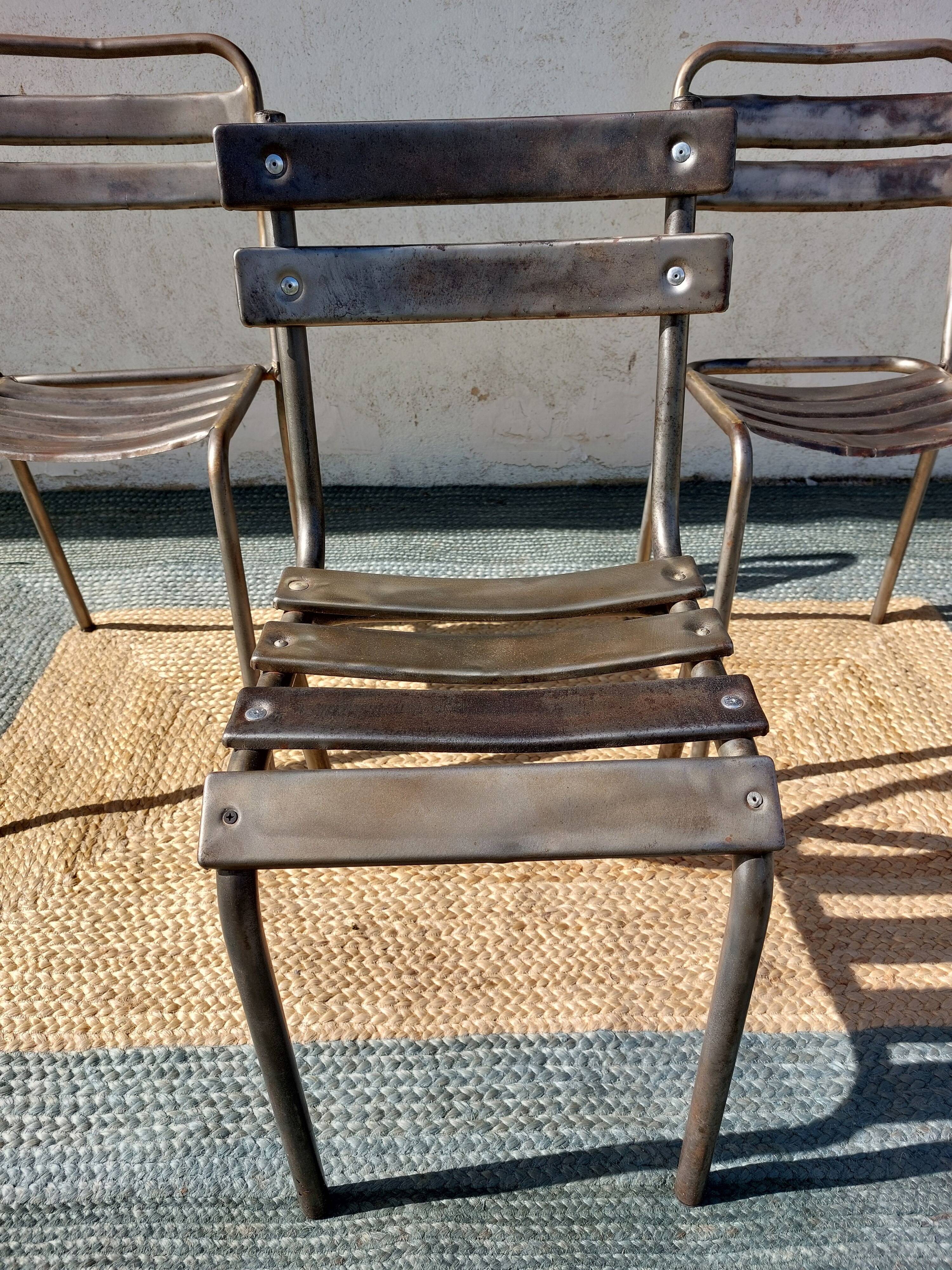 3 metal chairs, Tolix style