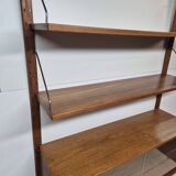 Teak shelving system with glass cabinet, marked made in Denmark, 1960.