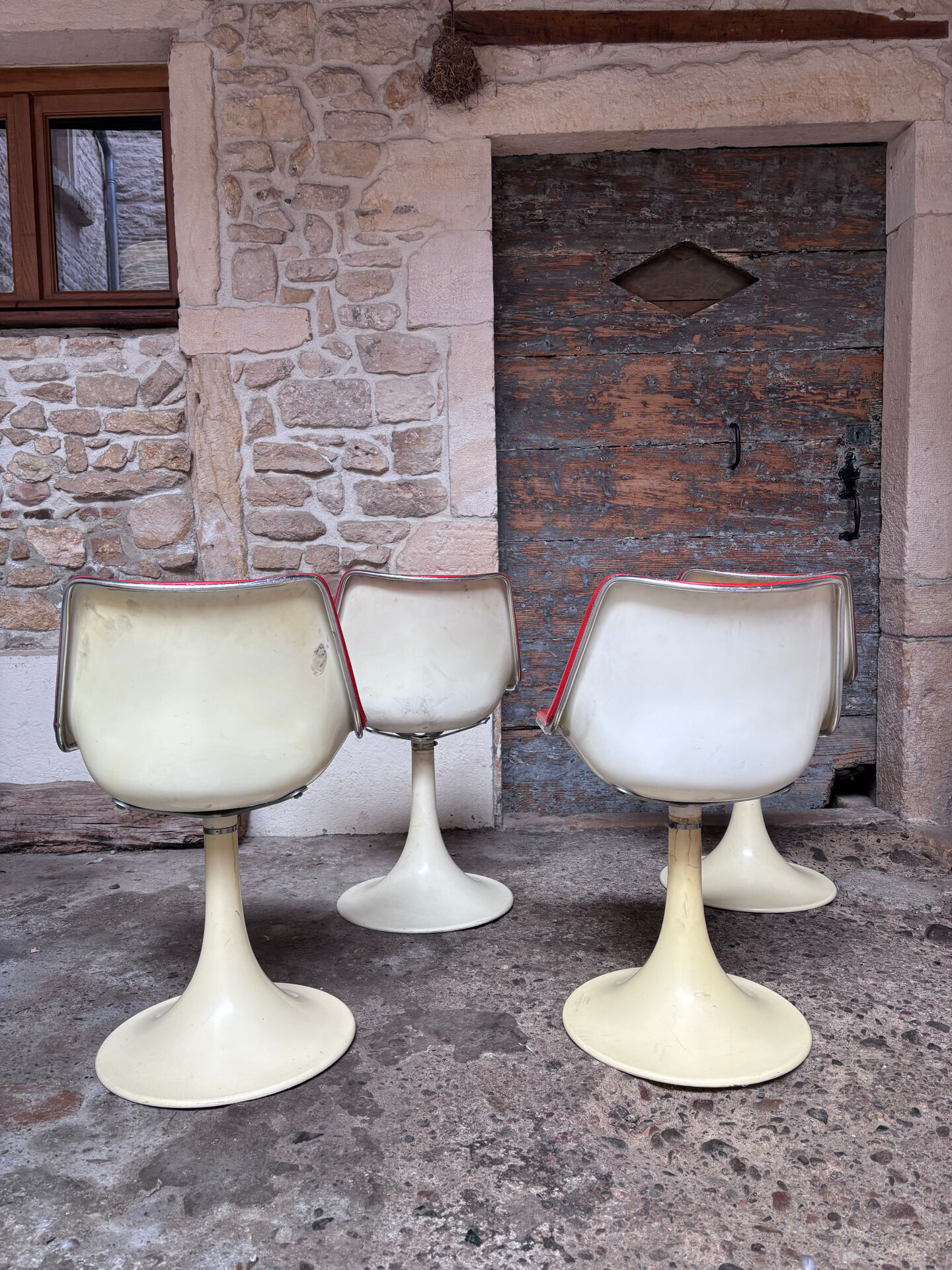Tulip leg armchairs