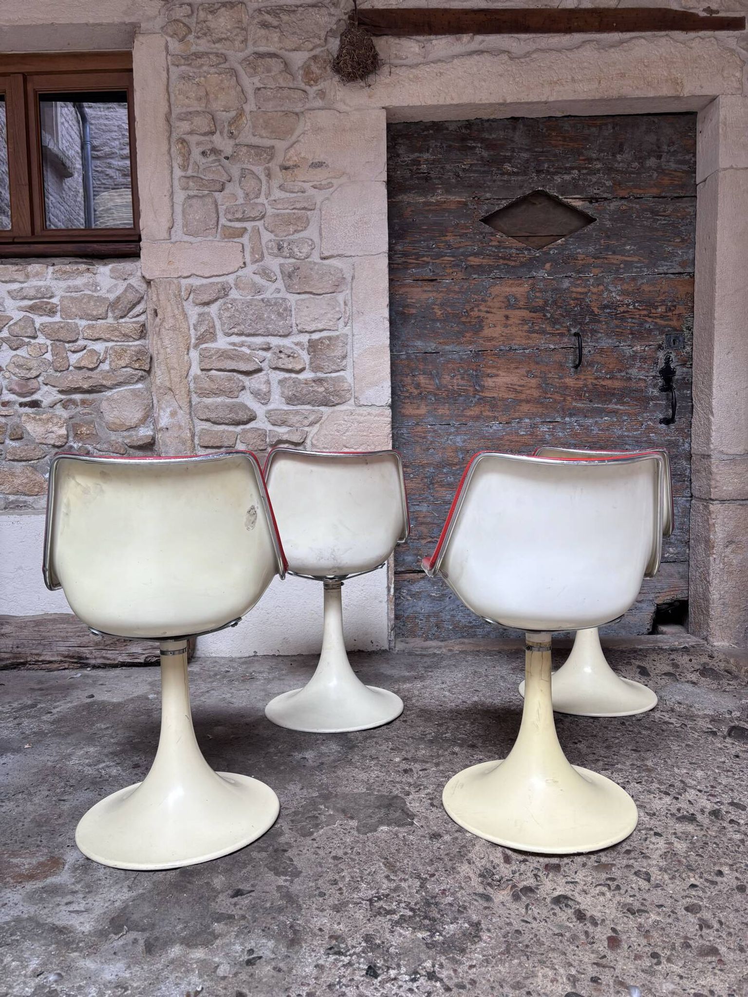 Tulip leg armchairs