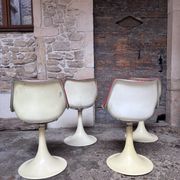 Tulip leg armchairs