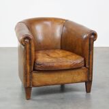 Club chair made of sheepskin leather with the most beautiful colors and a stunning patina