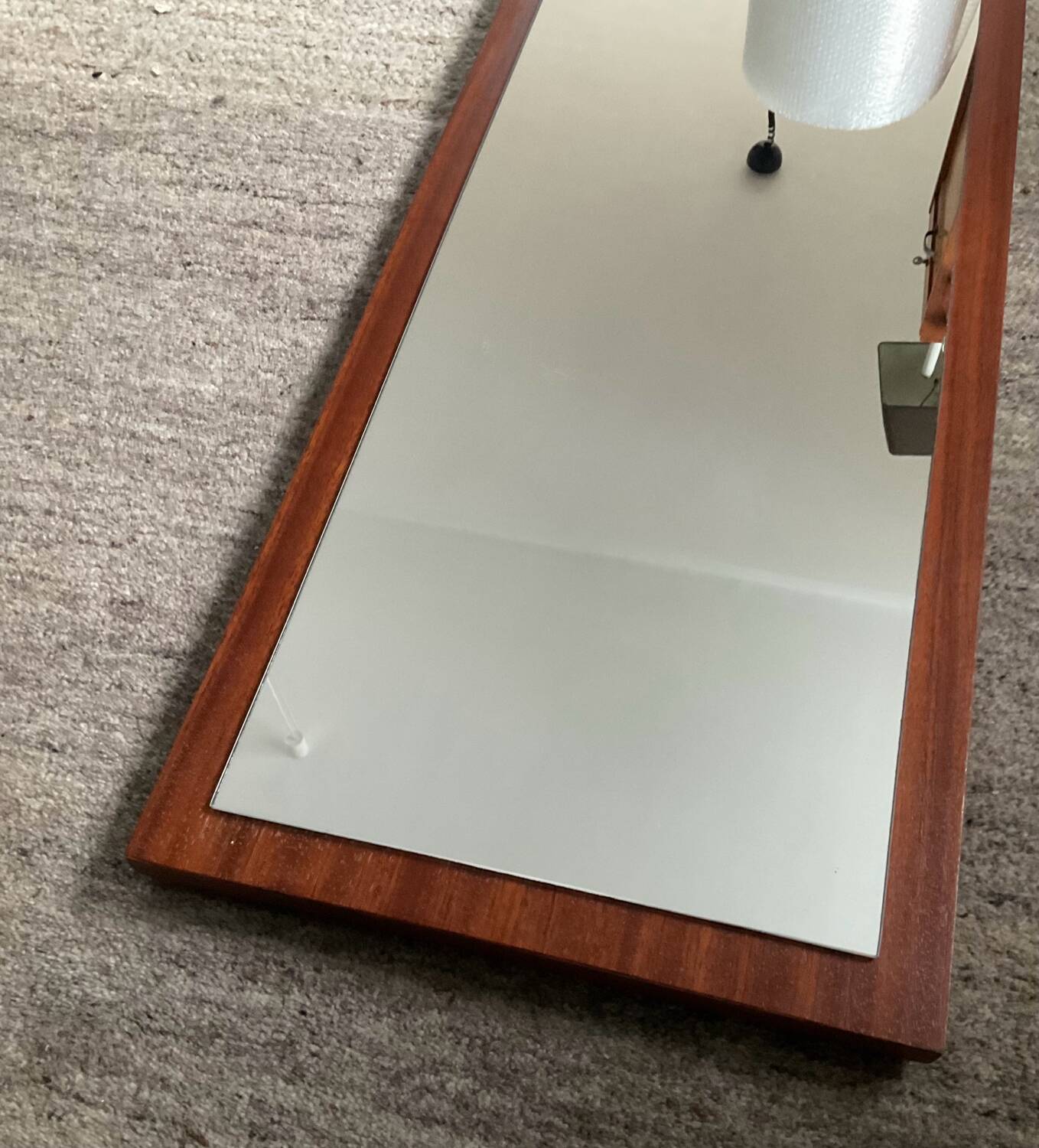 Scandinavian mirror in solid teak from the 60s-70s.