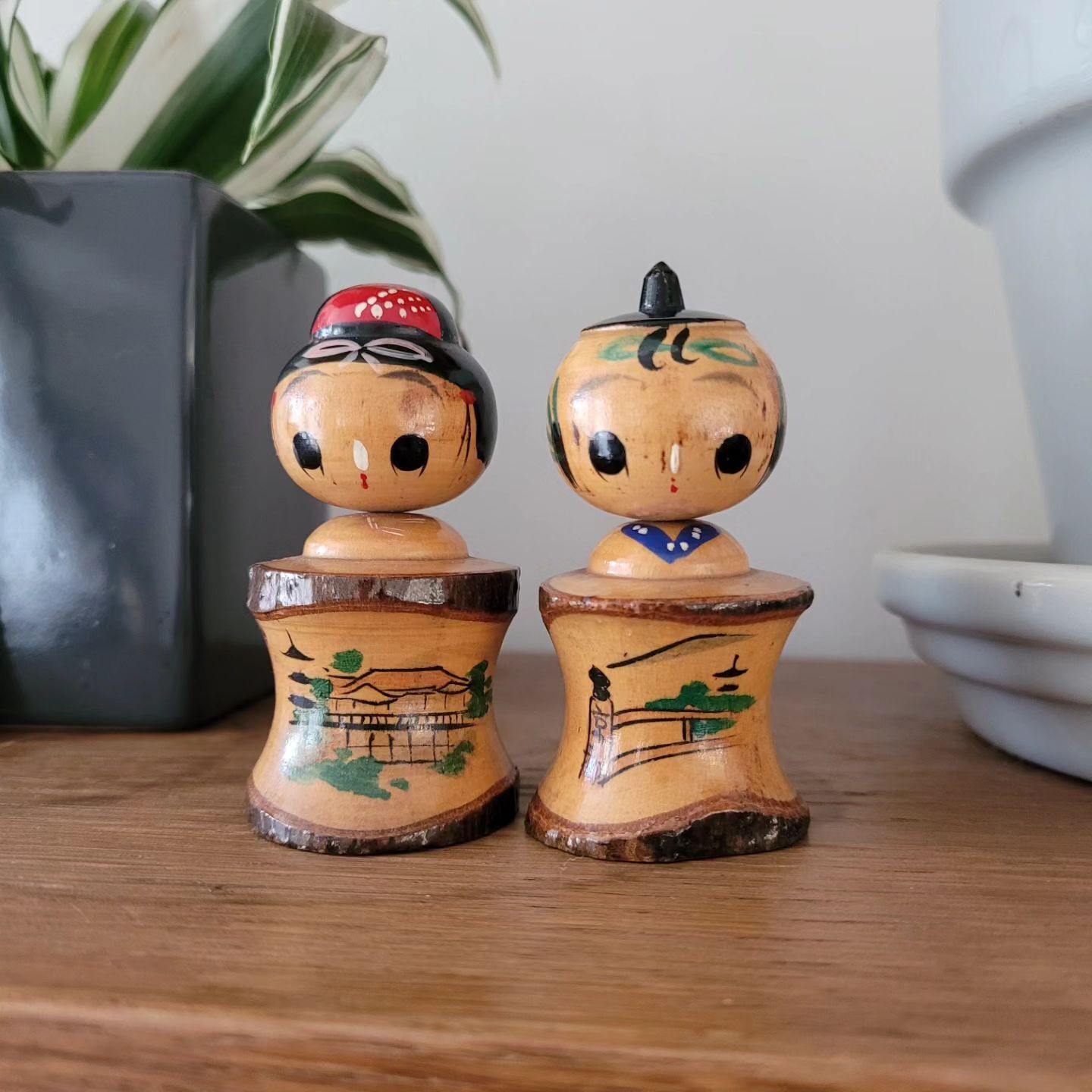 Two Kokeshi dolls