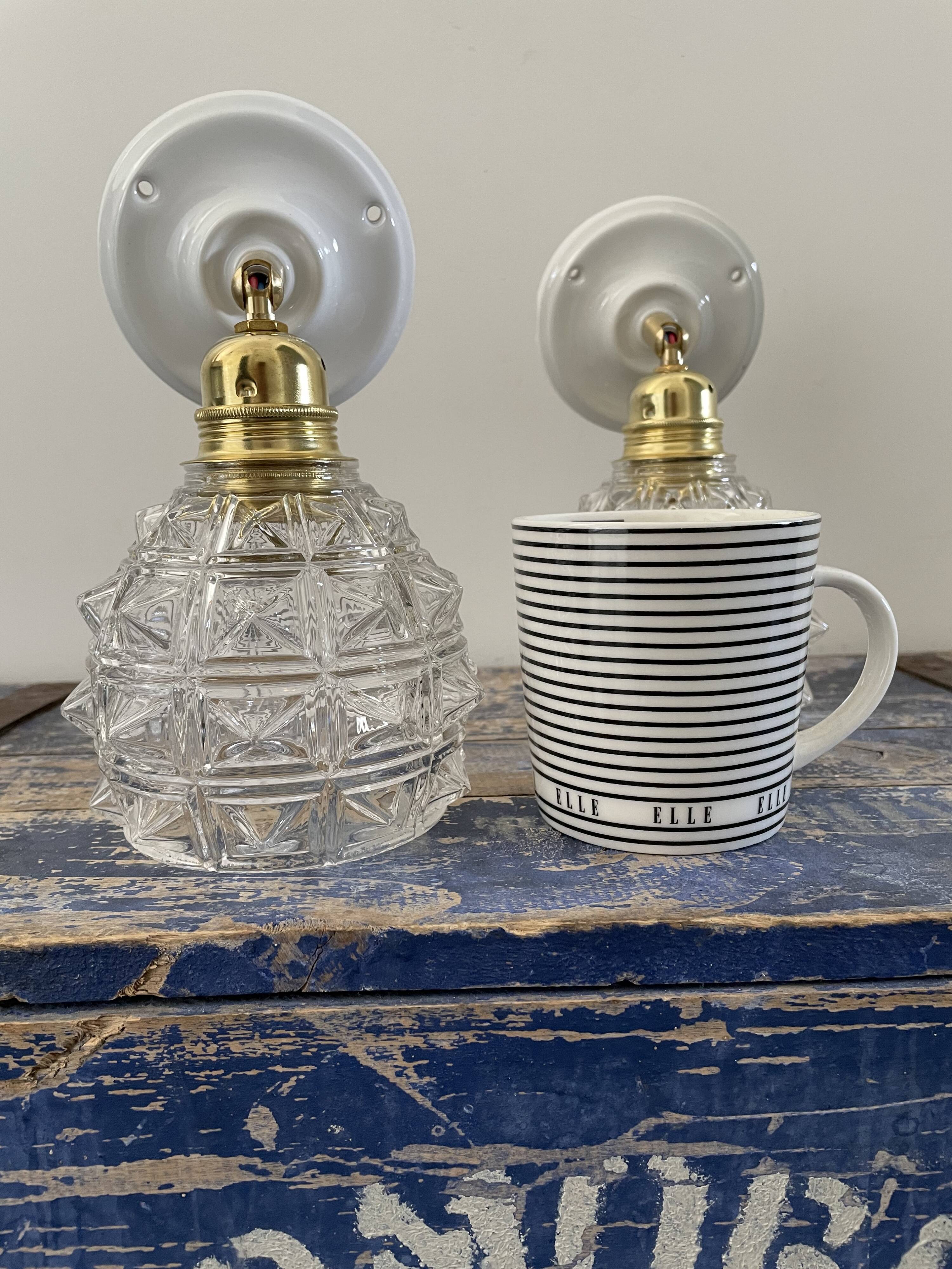 Pair of new electrified chiseled glass sconces