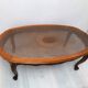 Cherry coffee table with cane top and vintage glass