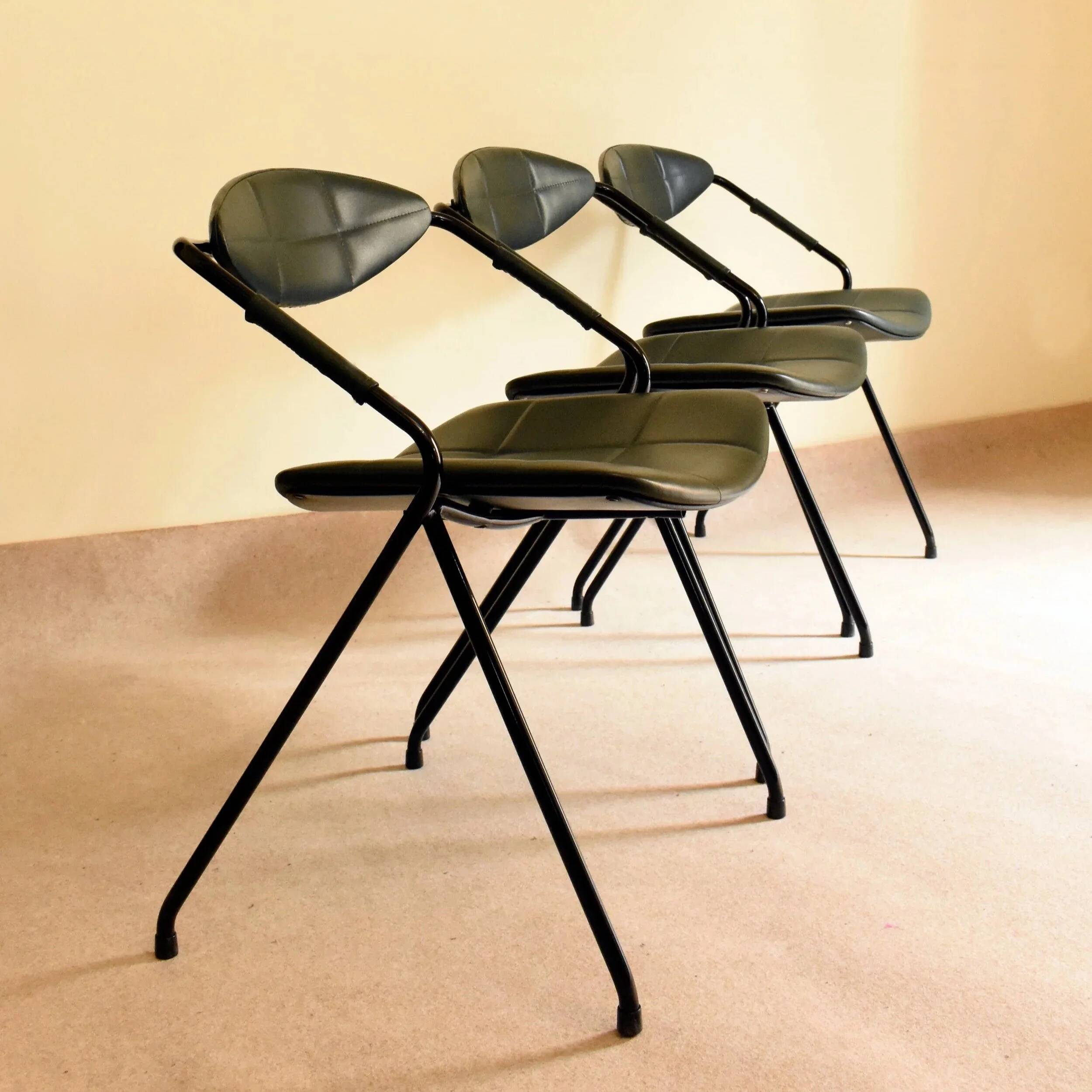 Set of three "Rugby" model chairs by Gilbert Steiner for Steiner, 1962.
