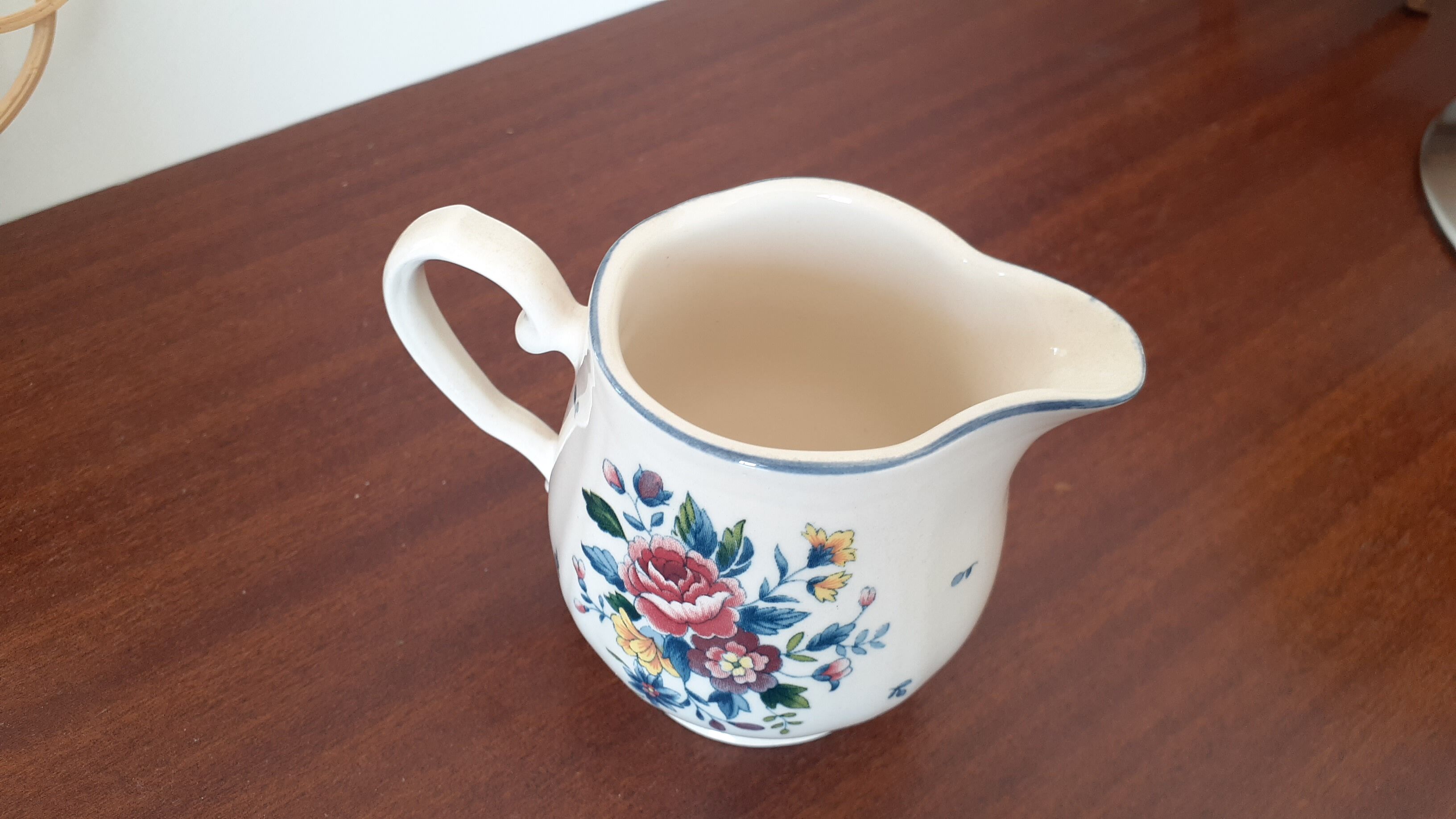 Flowery milk jug