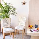 Pair of vintage chairs reupholstered with palm pattern fabric