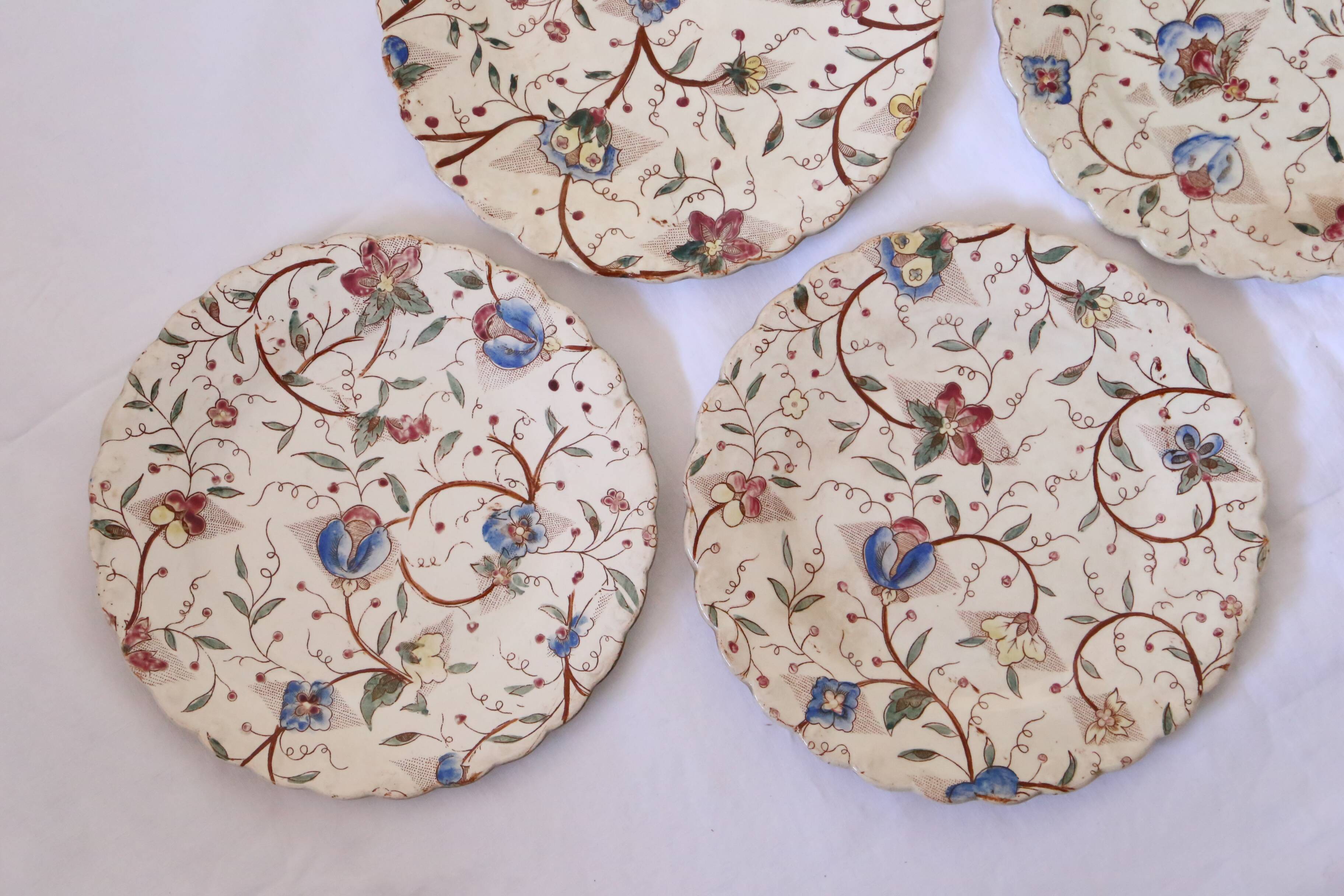 Set of 4 old polychrome plates