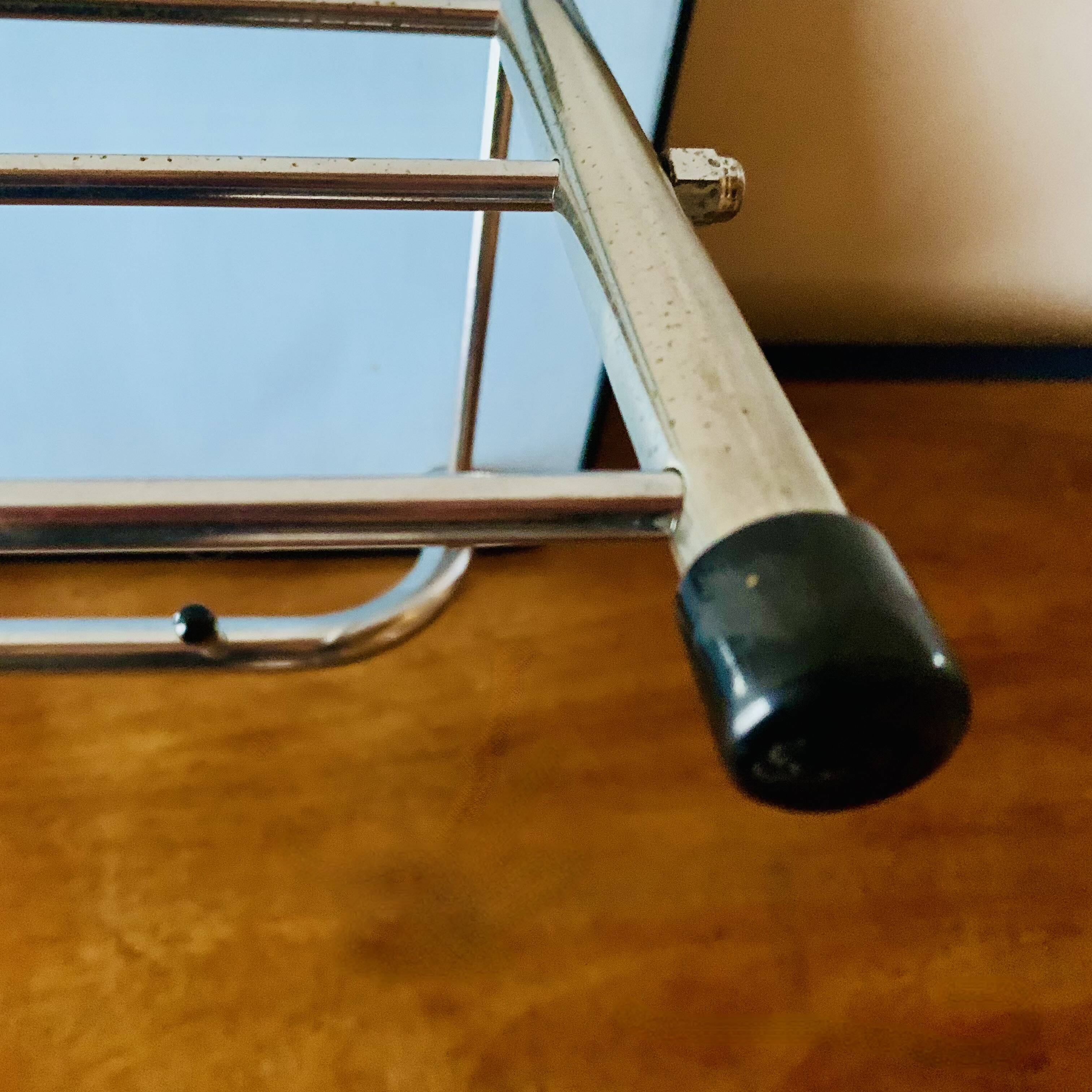 Vintage wall-mounted coat rack in wood and chrome metal with mirror