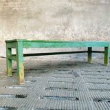 Old wooden bench sidetable green