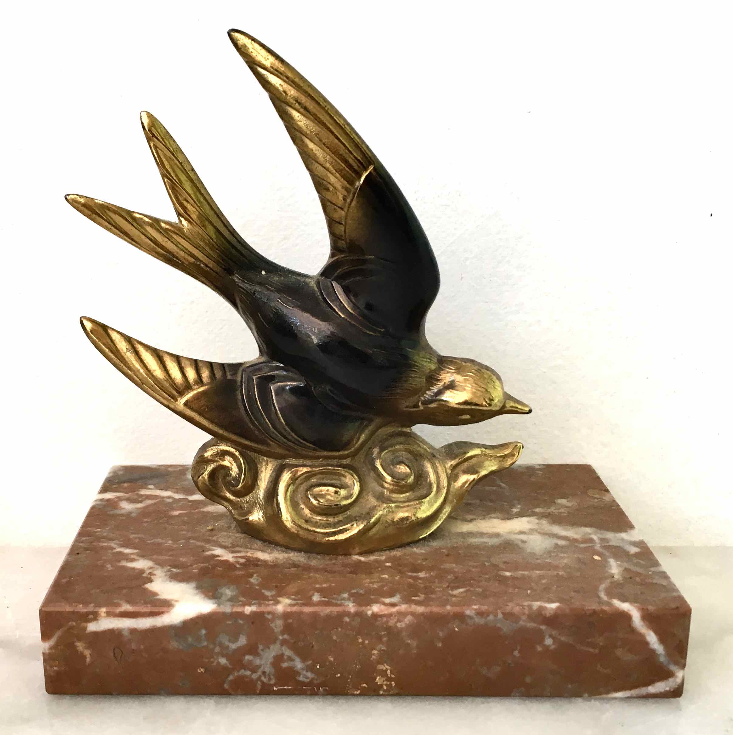 Marble swallow and brass paperweight