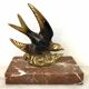 Marble swallow and brass paperweight