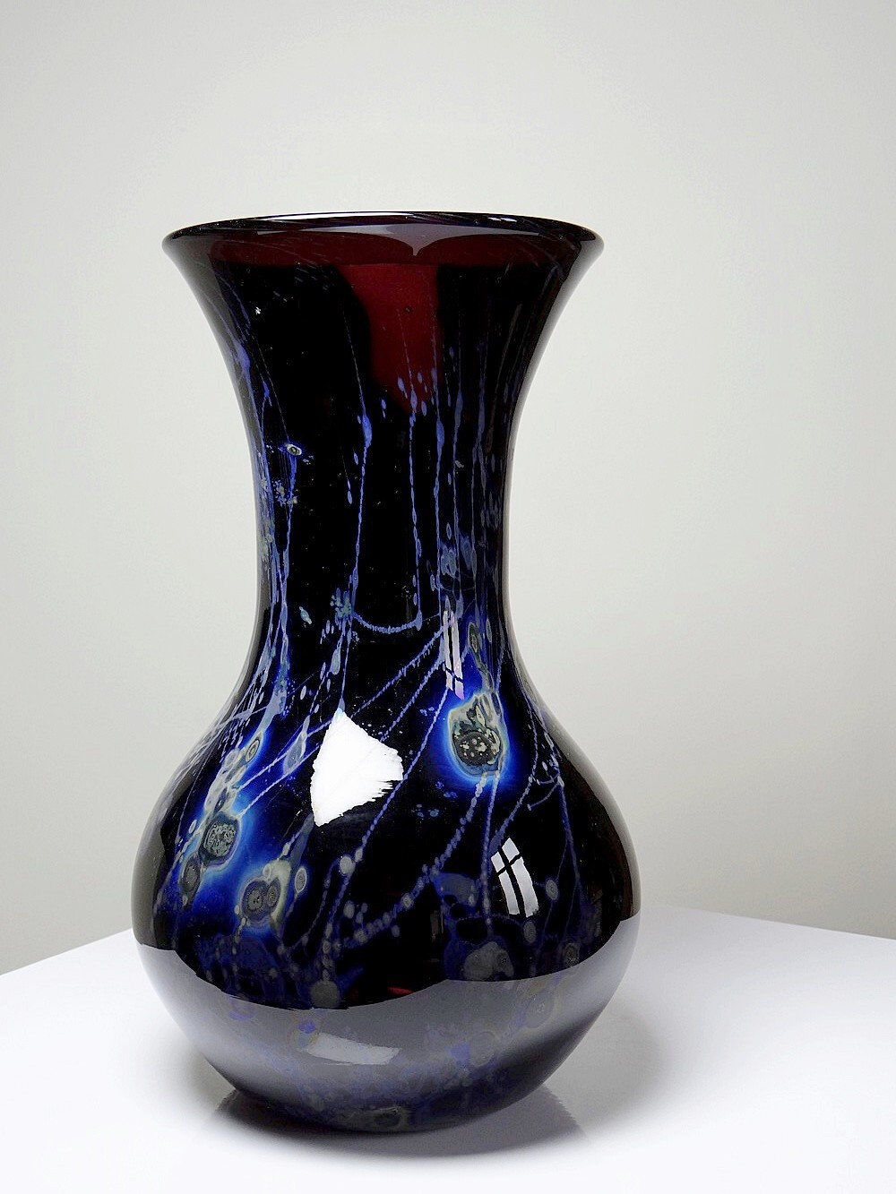 Large vintage purple art glass vase with silver glitter inclusions.