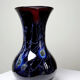 Large vintage purple art glass vase with silver glitter inclusions.