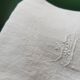 Set of 12 table napkins and an old damask linen tablecloth mono
