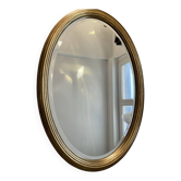 Grand miroir Ovale Deknudt en bois doré années 70