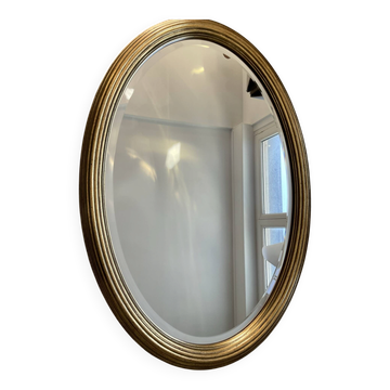 Grand miroir Ovale Deknudt en bois doré années 70