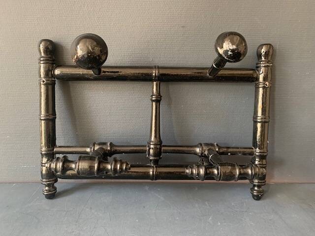 Wall-mounted coat rack in wood 1900