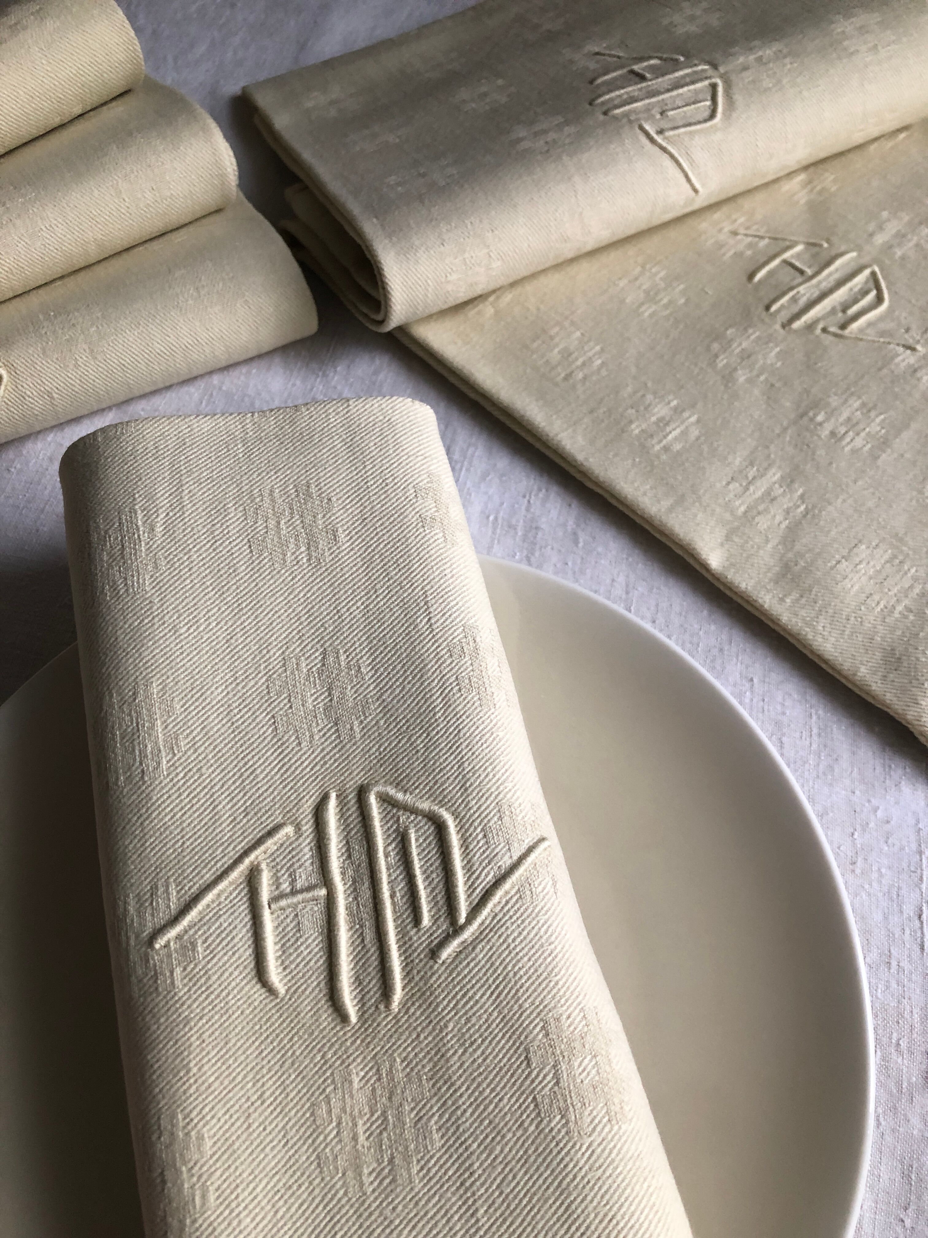 Antique napkins damascus and monogrammed tinted fresh butter