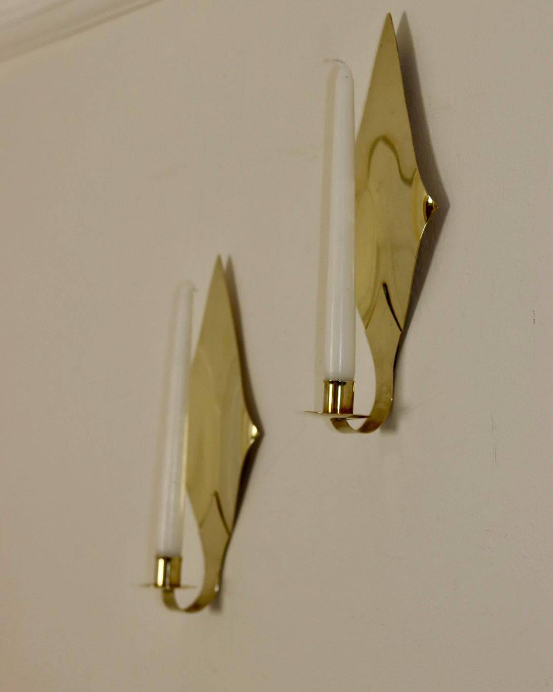 Pair of Swedish brass wall sconces from the mid-century.