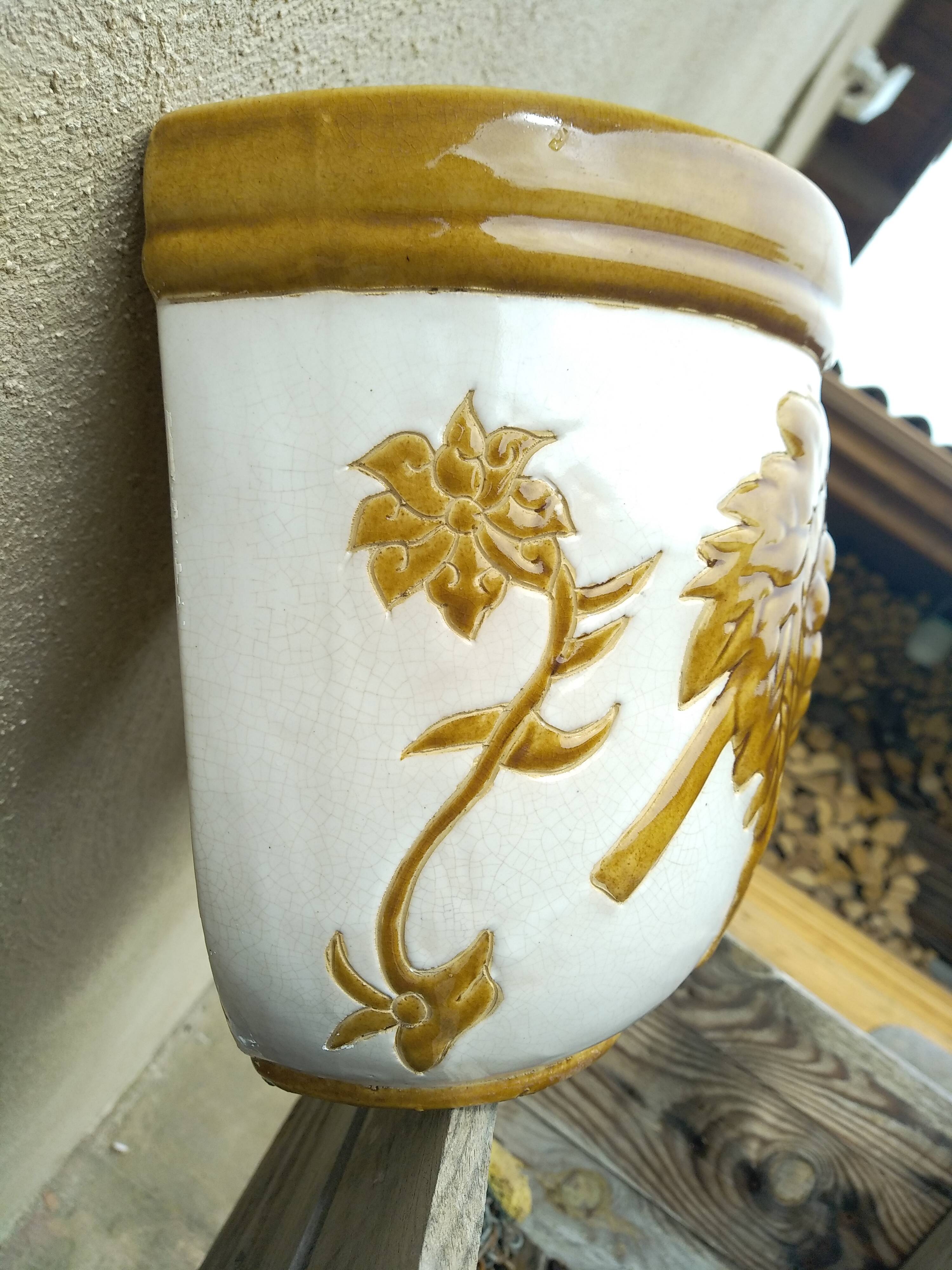 Pair of wall-mounted planters/flower pots