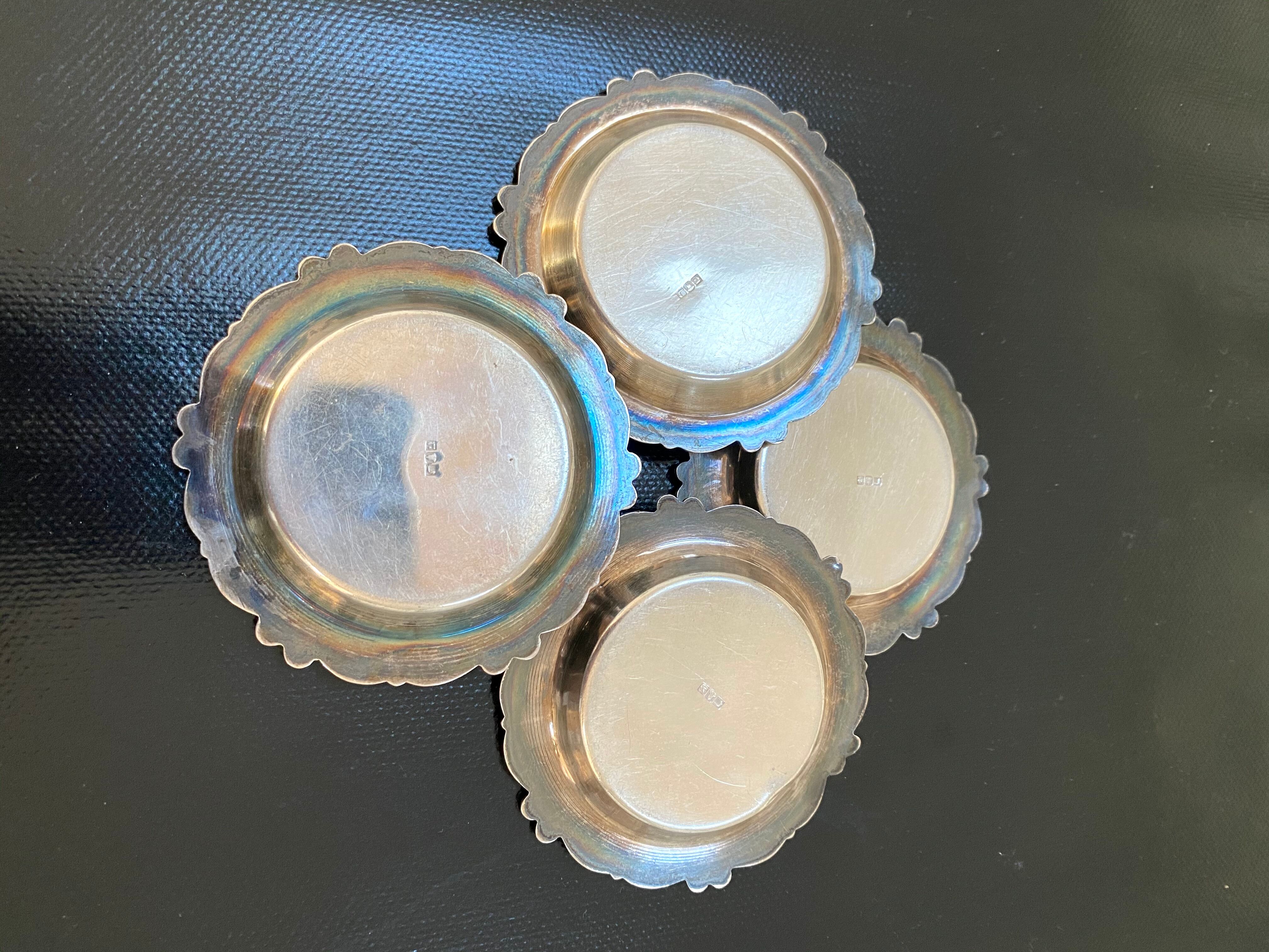 Set of 4 antique silver cups