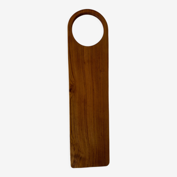 Cutting or presentation board of monoxyl teak with handle