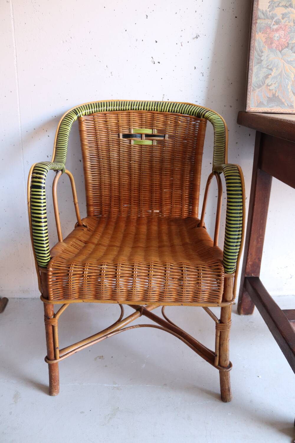 Antique two-tone rattan armchair