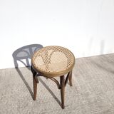 Low stool in cane and curved wood