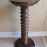 Wooden screw-mounted pedestal table