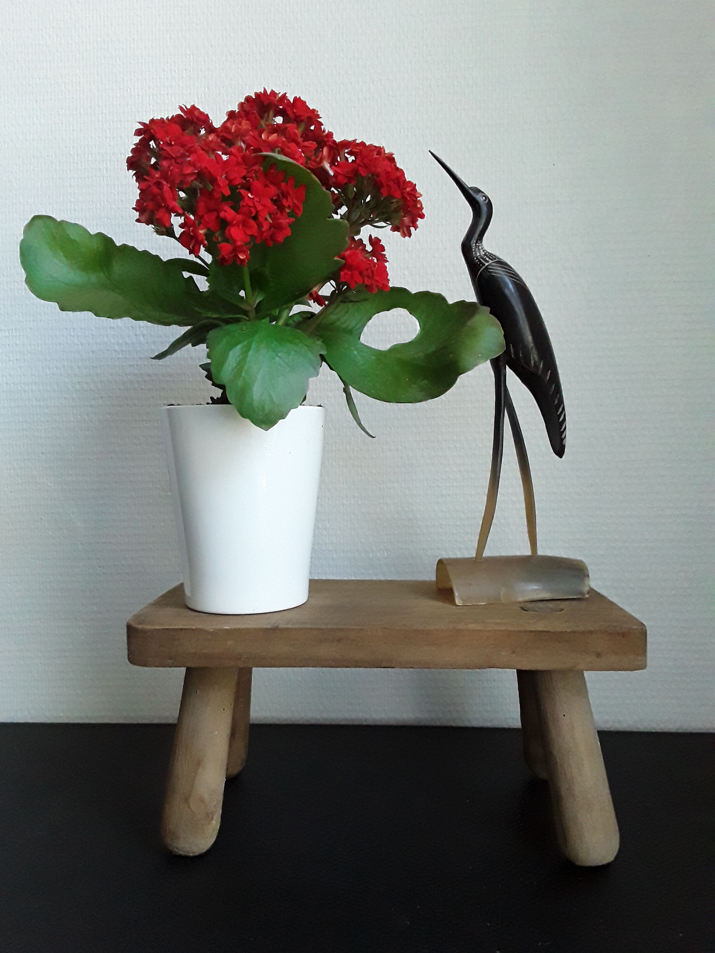 Vintage footstool in light wood