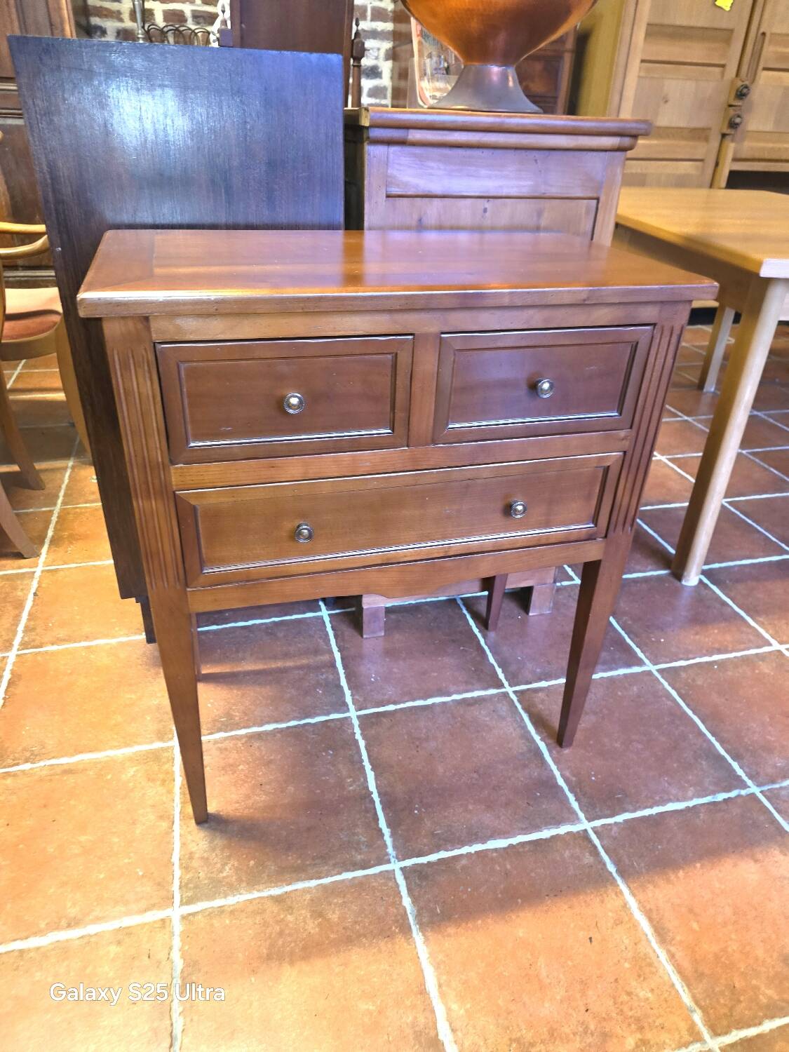 Louis XVI style commode in solid cherry wood.