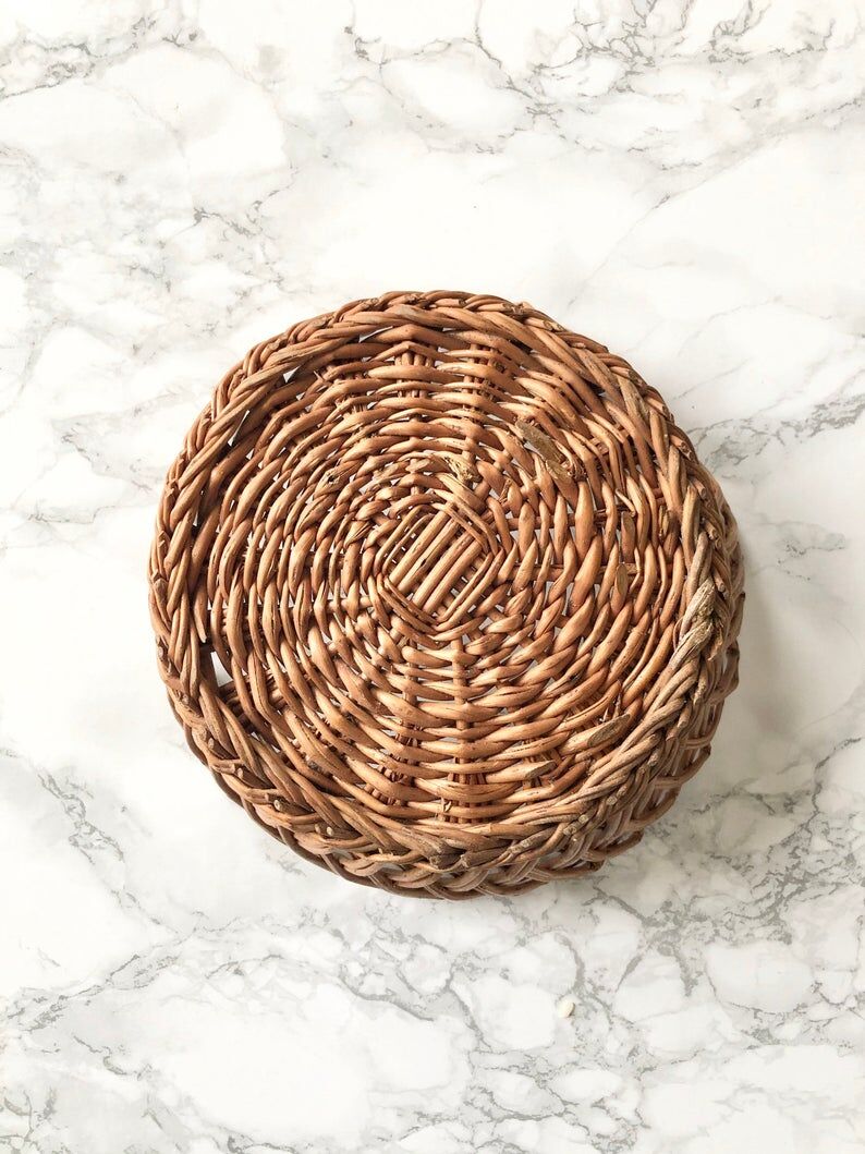 Old French toast or fruit basket in braided wicker