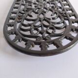 Large vintage black cast iron trivet