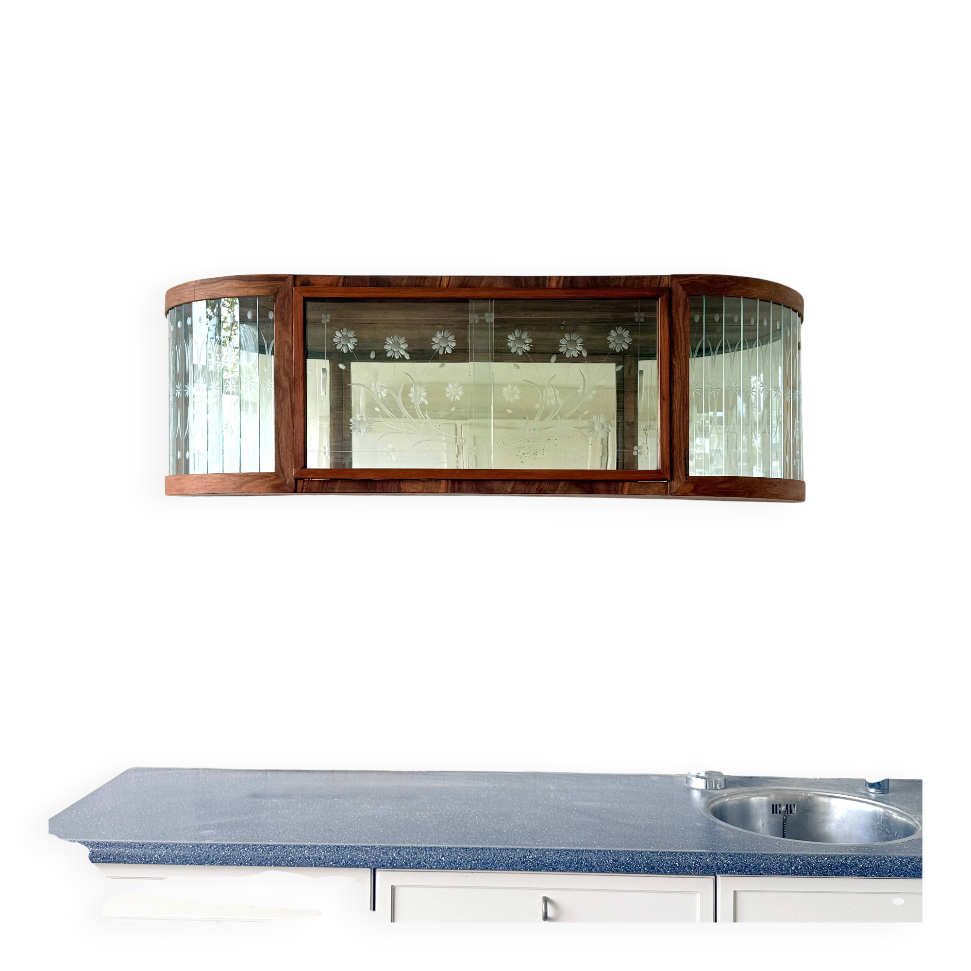 Art Deco-style wall-mounted display cabinet with floral engraving