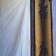 Antique Louis Philippe style gilded mirror decorated with floral motifs