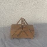 Sewing box in old varnished wood
