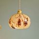 Trio of Art Deco pendant lights in marbled opaline glass, 1920s-30s