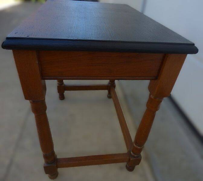 Nightstand or side table in solid wood with a black top.